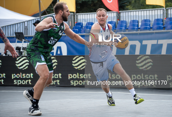 Tomasz Rudko and Przemyslaw Tradecki participate in the LOTTO 3x3 League basketball game in Sosnowiec, Poland, on September 8, 2024. The Lot...