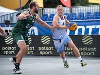 Tomasz Rudko and Przemyslaw Tradecki participate in the LOTTO 3x3 League basketball game in Sosnowiec, Poland, on September 8, 2024. The Lot...