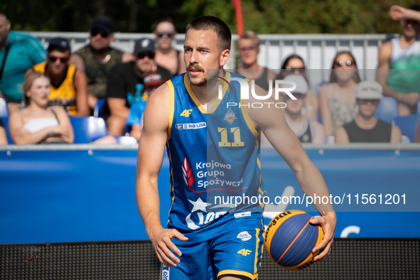 Grzegorz Kaminski participates in the LOTTO 3x3 League basketball game in Sosnowiec, Poland, on September 8, 2024. The Lotto 3x3 Liga tourna...