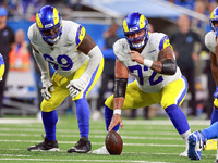 DETROIT,MICHIGAN-SEPTEMBER 8:  Guard Jonah Jackson (72) of the Los Angeles Rams gestures at the line of scrimmage during a game between the...