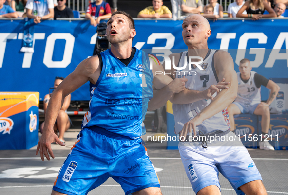 Wojciech Leszczynski and Wojciech Bernasiak participate in the LOTTO 3x3 League basketball game in Sosnowiec, Poland, on September 8, 2024....