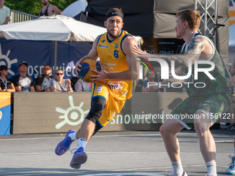 Wiktor Sewiol participates in the LOTTO 3x3 League basketball game in Sosnowiec, Poland, on September 8, 2024. The Lotto 3x3 Liga tournament...