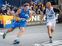 Maksymilian Szefler and Marcin Zarzeczny participate in the LOTTO 3x3 League basketball game in Sosnowiec, Poland, on September 8, 2024. The...