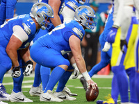 DETROIT,MICHIGAN-SEPTEMBER 8: Center Frank Ragnow (77) of the Detroit Lions prepares to snap the ball  during a game between the Detroit Lio...