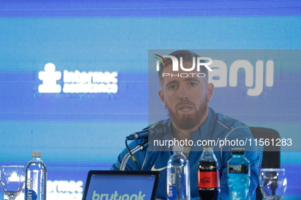 Iker Muniain gestures as he is unveiled at Estadio Pedro Bidegain in Buenos Aires, Argentina, on September 9, 2024. 