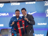 Iker Muniain, the new signing, poses with Marcelo Moretti, President of San Lorenzo de Almagro, during his presentation at Estadio Pedro Bid...