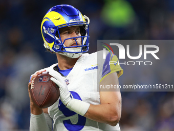 DETROIT,MICHIGAN-SEPTEMBER 8:  Quarterback Matthew Stafford (9) of the Los Angeles Rams looks to pass the ball during warmups ahead of a gam...