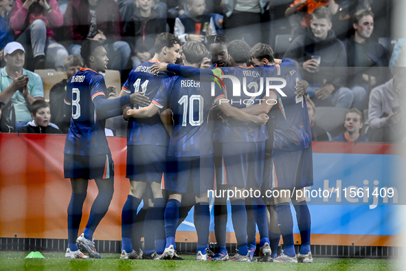 Players of the Netherlands celebrate the goal of Netherlands player Emmanuel Emegha, making the score 1-0, during the match between the Neth...