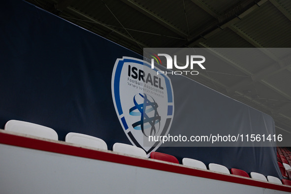 The Israel logo is displayed prior to the UEFA Nations League 2024/25 League A Group A2 match between Israel and Italy at Bozsik Arena Stadi...