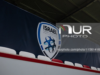 The Israel logo is displayed prior to the UEFA Nations League 2024/25 League A Group A2 match between Israel and Italy at Bozsik Arena Stadi...