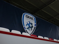 The Israel logo is displayed prior to the UEFA Nations League 2024/25 League A Group A2 match between Israel and Italy at Bozsik Arena Stadi...