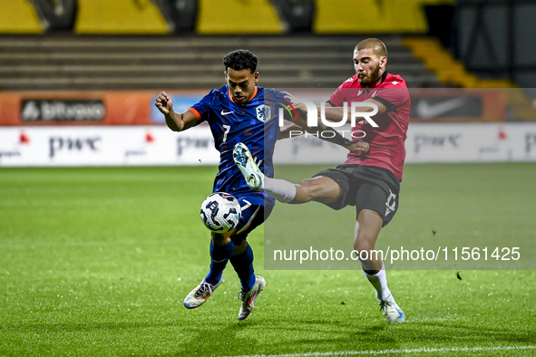 Netherlands player Million Manhoef and Georgia player Gizo Mamageishvili during the match between the Netherlands and Georgia at the Covebo...