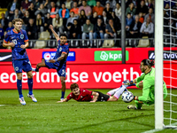 Netherlands player Youri Regeer, Netherlands player Ian Maatsen, and Georgia goalkeeper Luka Kharatishvili during the match between the Neth...