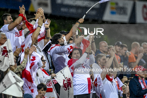 Fans of Georgia during the match between the Netherlands and Georgia at the Covebo Stadium - De Koel for the Qualification EK 2025 group C m...