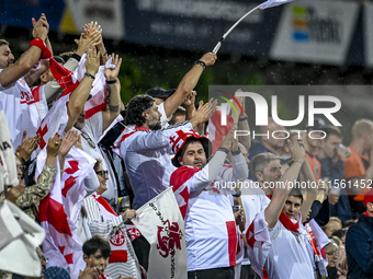 Fans of Georgia during the match between the Netherlands and Georgia at the Covebo Stadium - De Koel for the Qualification EK 2025 group C m...