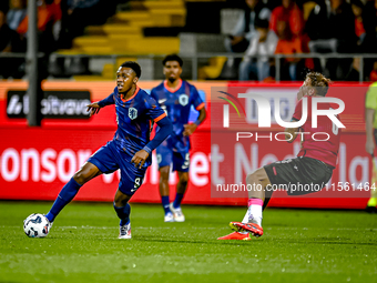 Netherlands player Antoni Milambo and Georgia player Otar Mamageishvili during the match between the Netherlands and Georgia at the Covebo S...