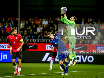 Netherlands player Youri Baas and Georgia goalkeeper Luka Kharatishvili during the match between the Netherlands and Georgia at the Covebo S...