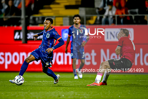 Netherlands player Antoni Milambo and Georgia player Otar Mamageishvili during the match between the Netherlands and Georgia at the Covebo S...