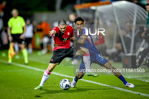 Georgia player Davit Zurabiani and Netherlands player Ian Maatsen during the match between the Netherlands and Georgia at the Covebo Stadium...