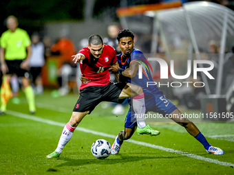 Georgia player Davit Zurabiani and Netherlands player Ian Maatsen during the match between the Netherlands and Georgia at the Covebo Stadium...