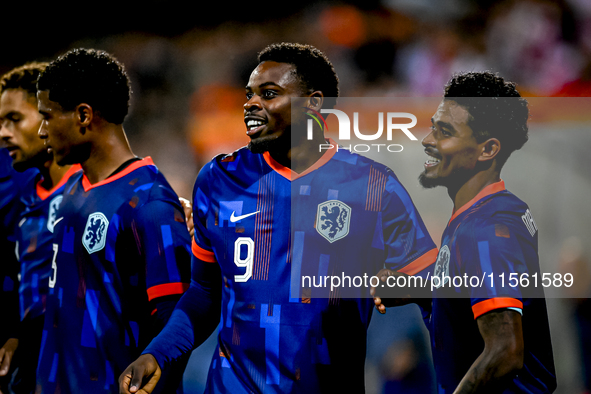 Players of the Netherlands celebrate the goal of Netherlands player Noah Ohio, making the score 3-1, during the match between the Netherland...