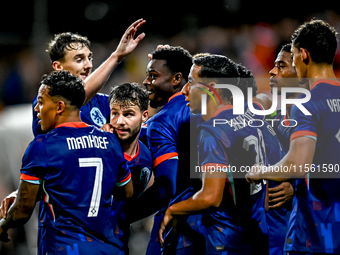 Players of the Netherlands celebrate the goal of Netherlands player Noah Ohio, making the score 3-1, during the match between the Netherland...