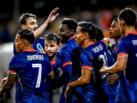 Players of the Netherlands celebrate the goal of Netherlands player Noah Ohio, making the score 3-1, during the match between the Netherland...