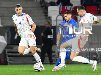 Alessandro Buongiorno and Liel Abada are in action during Israel vs. Italy: matchday 2 of UEFA Nations League 2024-2025, in Budapest, Hungar...