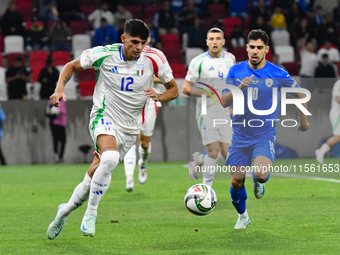 Raoul Bellanova and Manor Solomon are in action during Israel vs Italy: matchday 2 of UEFA Nations League 2024-2025, in Bozsik Arena, Budape...