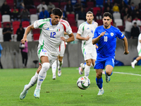 Raoul Bellanova and Manor Solomon are in action during Israel vs Italy: matchday 2 of UEFA Nations League 2024-2025, in Bozsik Arena, Budape...