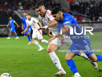 Manor Solomon and Alessandro Buongiorno are in action during Israel vs. Italy: matchday 2 of UEFA Nations League 2024-2025, at Bozsik Arena...