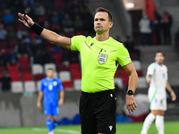 Ivan Kruzliak (SVK), central referee, officiates during Israel vs Italy: matchday 2 of UEFA Nations League 2024-2025, in Budapest, Hungary,...