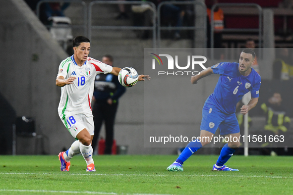 Giacomo Raspadori and Neta Lavi in action during Israel vs Italy: matchday 2 of UEFA Nations League 2024-2025, in Budapest, Hungary, on Sept...