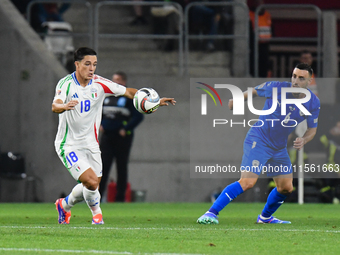 Giacomo Raspadori and Neta Lavi in action during Israel vs Italy: matchday 2 of UEFA Nations League 2024-2025, in Budapest, Hungary, on Sept...