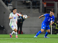 Giacomo Raspadori and Neta Lavi in action during Israel vs Italy: matchday 2 of UEFA Nations League 2024-2025, in Budapest, Hungary, on Sept...