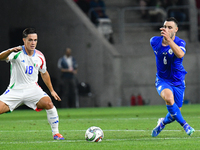 Giacomo Raspadori and Neta Lavi in action during Israel vs Italy: matchday 2 of UEFA Nations League 2024-2025, in Budapest, Hungary, on Sept...