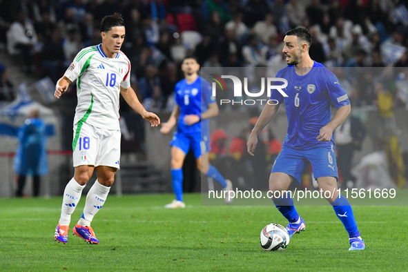 Giacomo Raspadori and Neta Lavi in action during Israel vs Italy: matchday 2 of UEFA Nations League 2024-2025, in Budapest, Hungary, on Sept...