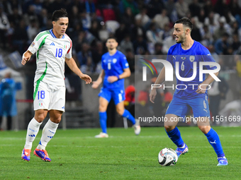 Giacomo Raspadori and Neta Lavi in action during Israel vs Italy: matchday 2 of UEFA Nations League 2024-2025, in Budapest, Hungary, on Sept...