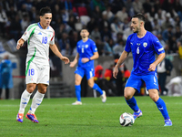 Giacomo Raspadori and Neta Lavi in action during Israel vs Italy: matchday 2 of UEFA Nations League 2024-2025, in Budapest, Hungary, on Sept...