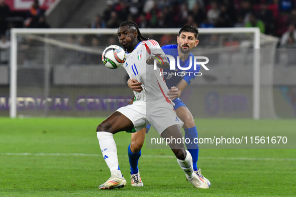 Moise Kean and Idan Nachmias are in action during Israel vs Italy: matchday 2 of UEFA Nations League 2024-2025, in Bozsik Arena, Budapest, H...