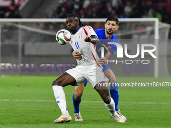 Moise Kean and Idan Nachmias are in action during Israel vs Italy: matchday 2 of UEFA Nations League 2024-2025, in Bozsik Arena, Budapest, H...