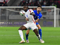 Moise Kean and Idan Nachmias are in action during Israel vs Italy: matchday 2 of UEFA Nations League 2024-2025, in Bozsik Arena, Budapest, H...