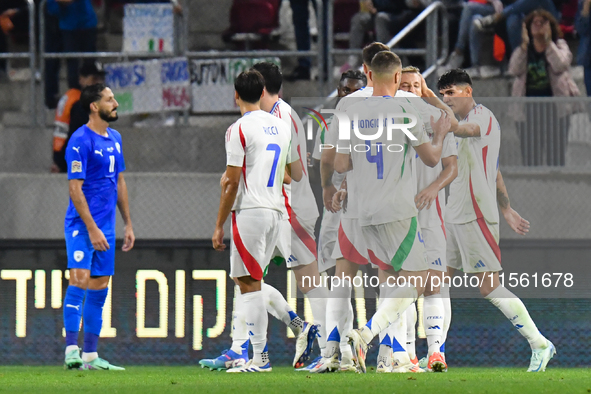 Players of Italy's national team celebrate after scoring during the Israel vs Italy match on matchday 2 of the UEFA Nations League 2024-2025...