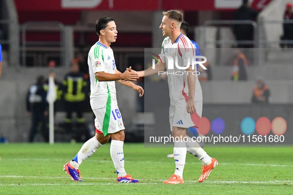 Giacomo Raspadori and Davide Frattesi celebrate after scoring during Israel vs Italy: matchday 2 of UEFA Nations League 2024-2025, in Budape...