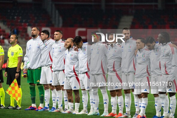 Players of Italy line up prior to the UEFA Nations League 2024/25 League A Group A2 match between Israel and Italy at Bozsik Arena Stadium i...