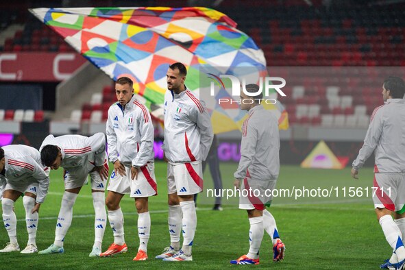 Players of Italy line up prior to the UEFA Nations League 2024/25 League A Group A2 match between Israel and Italy at Bozsik Arena Stadium i...