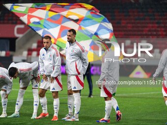 Players of Italy line up prior to the UEFA Nations League 2024/25 League A Group A2 match between Israel and Italy at Bozsik Arena Stadium i...