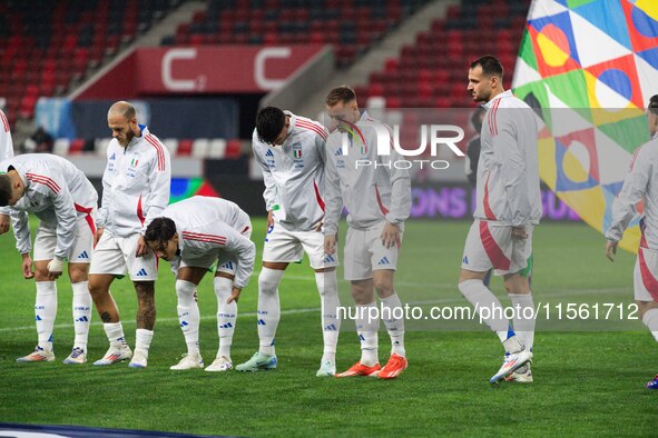 Players of Italy line up prior to the UEFA Nations League 2024/25 League A Group A2 match between Israel and Italy at Bozsik Arena Stadium i...