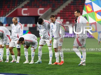 Players of Italy line up prior to the UEFA Nations League 2024/25 League A Group A2 match between Israel and Italy at Bozsik Arena Stadium i...