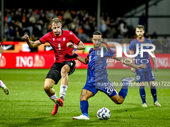 Georgia player Nodari Lominadze and Netherlands player Anass Salah-Eddine during the match between the Netherlands and Georgia at the Covebo...